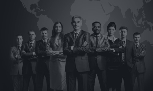 Confident business team with world map backdrop. - 830